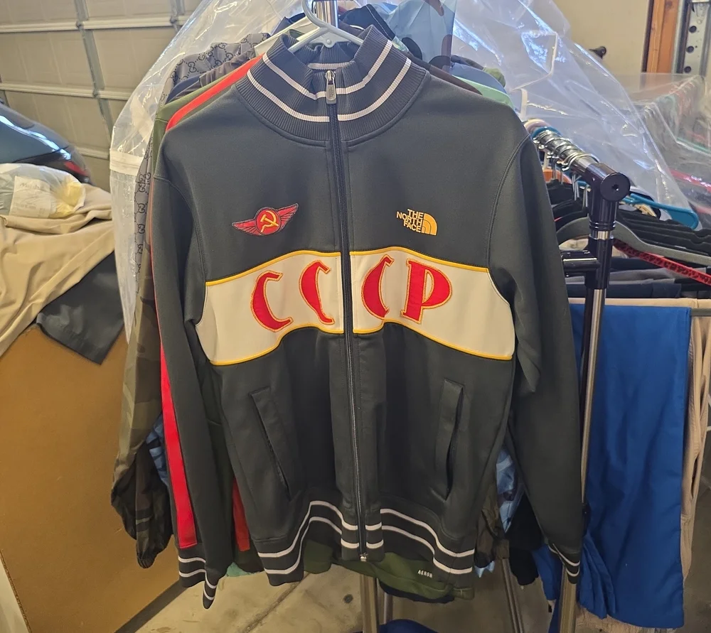The North Face Dark Green Track Jacket with Red & Yellow Accents